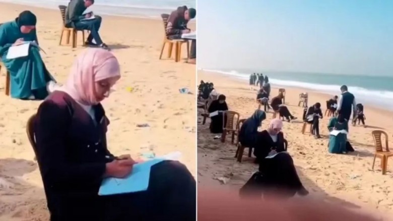 গাজায় সাগরতীরে বসে পরীক্ষা দিচ্ছেন শিক্ষার্থীরা